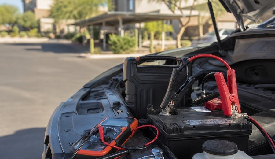 Mobile mechanic tools set up beside a car in Denver
